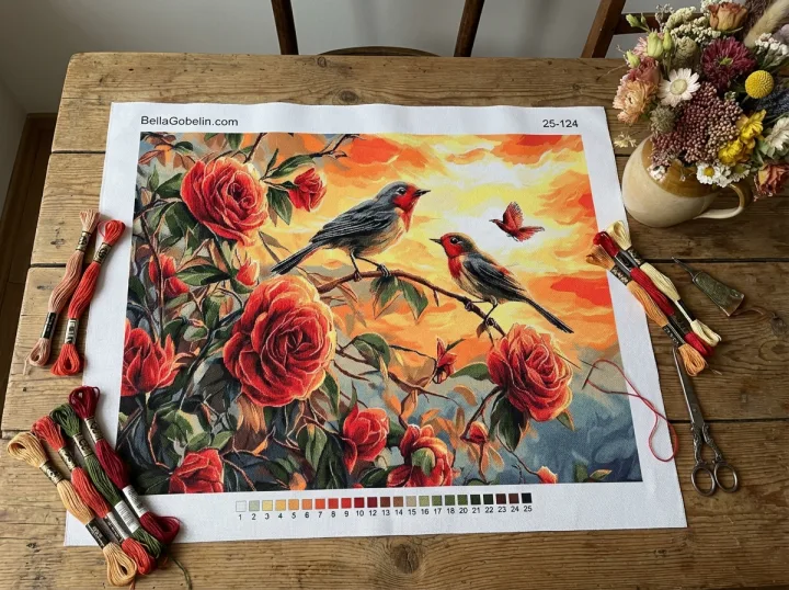 Vögel zwischen Rosen