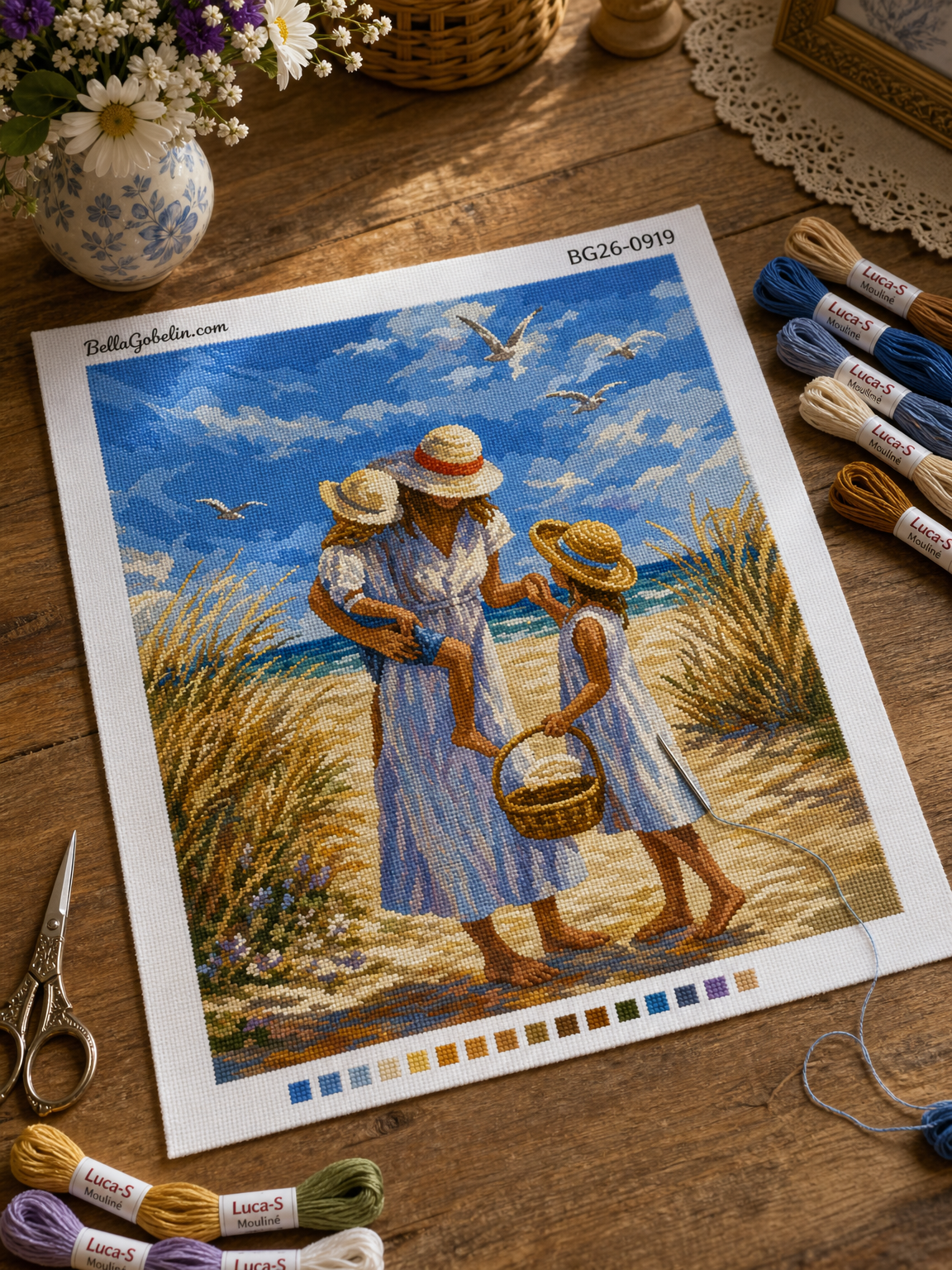 Eine Mutter und ihre Kinder am Strand